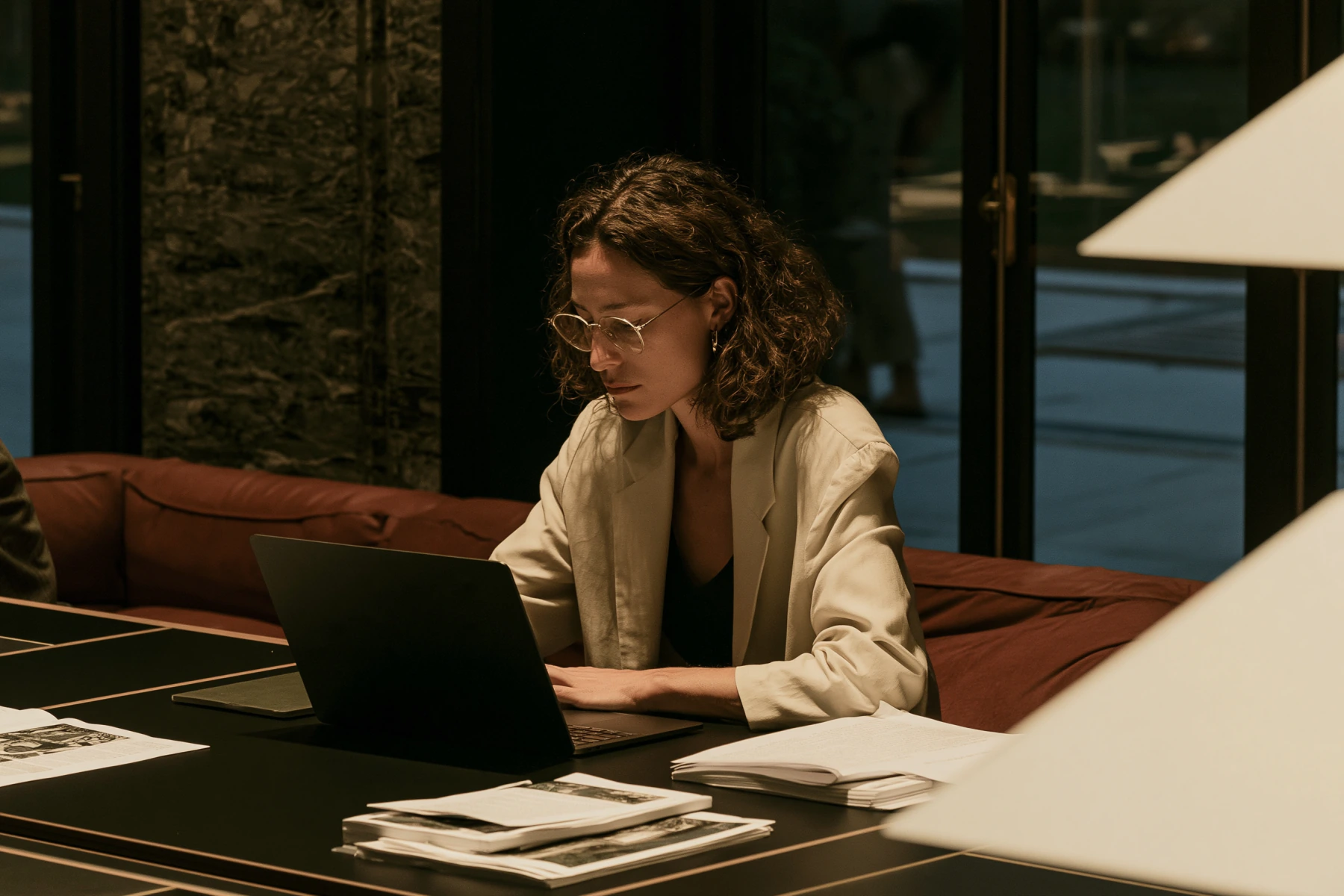 A practitioner working through an engagement on a laptop